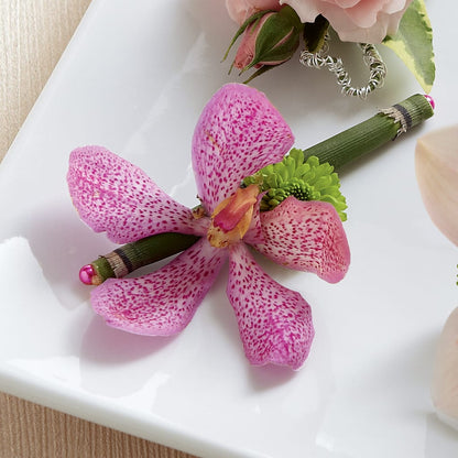 Pink Mokara Boutonniere –  Dalias Flowers, Cornelius NC